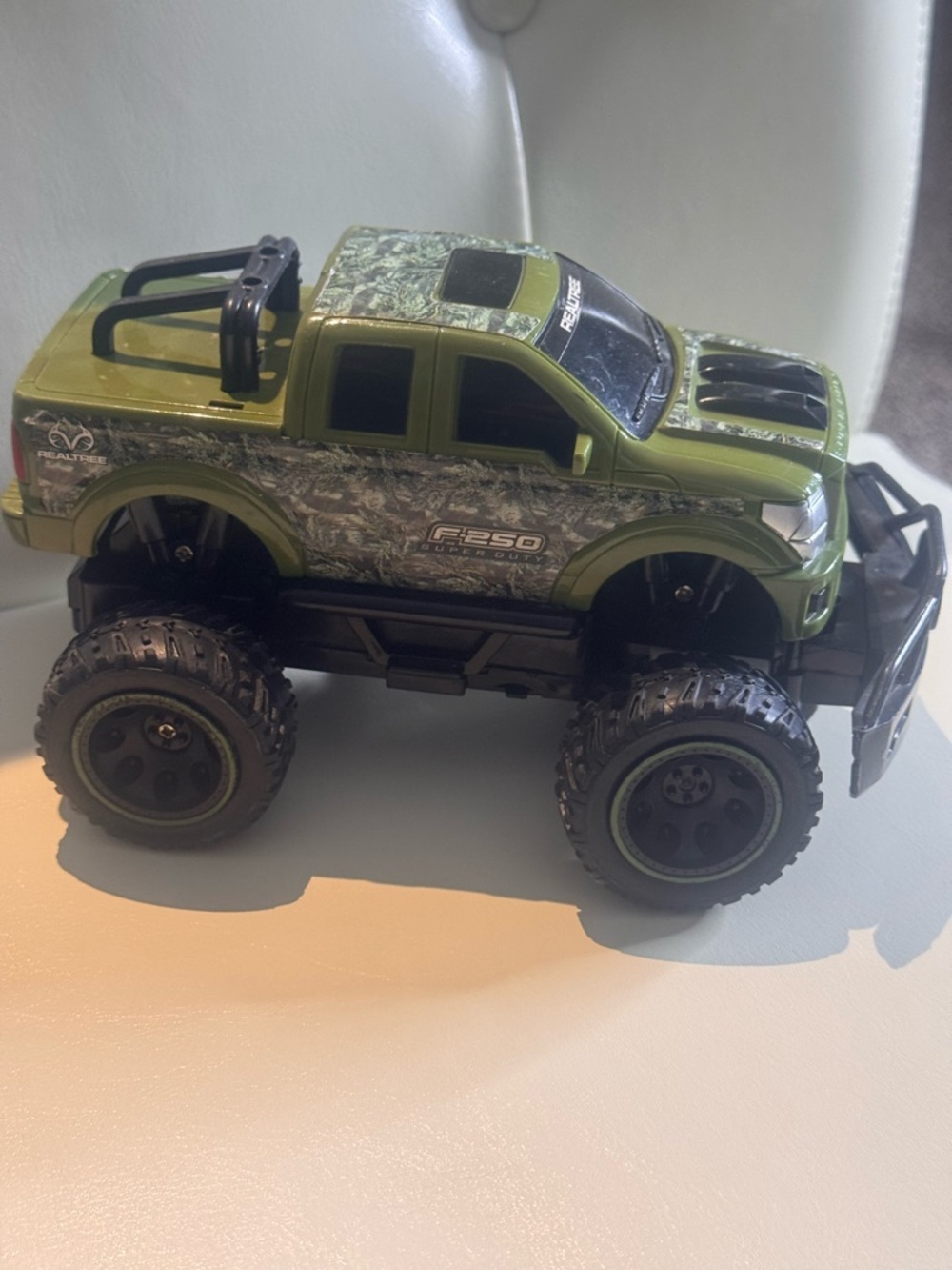 Real Tree Green Camouflage Monster Truck Toy - F-250